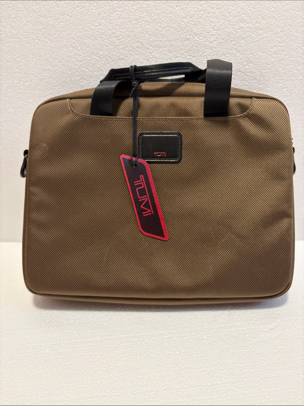 Tumi Brown Men's small carryall for IPad, Kindle. 12”x 9”